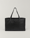 Laylowe Arden everyday tote bag in black leather, upright view showing slim shoulder handles and textured grain.