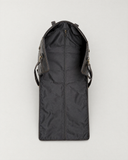 Laylowe Ellis charcoal leather garment duffle partially unfolded, showing the long zipped garment compartment.