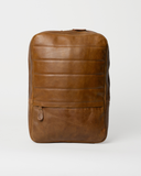 Front view of the Laylowe Lane tan leather backpack with stitched horizontal panels and a lower zip pocket.