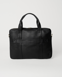 Rear view of the Laylowe Nolan black leather laptop case with a horizontal luggage strap and two carry handles.