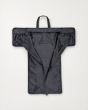 Laylowe Ellis charcoal leather garment duffle laid flat with its central garment compartment open and side pockets visible.