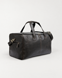 Laylowe Ellis charcoal full-grain leather garment duffle with a rectangular body, carry handles and shoulder strap.