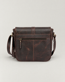 Back of the Laylowe Cora dark brown leather satchel showing its zip pocket and leather grain.