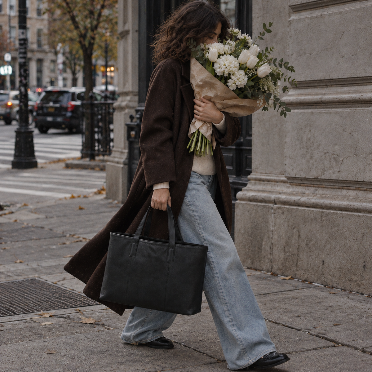 Laylowe leather tote carried on a city walk